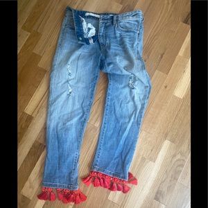 Adorable Anthropologie jeans with tassels